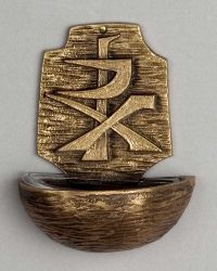 Holy water font with bronze relief design